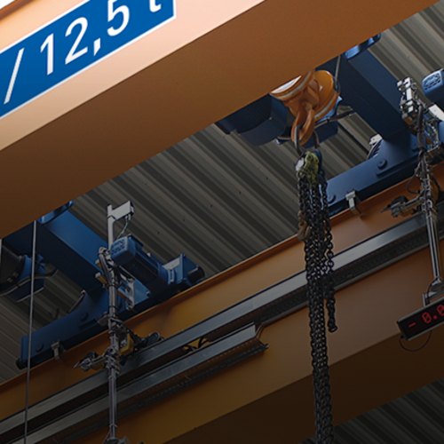 ABUS Zweischienenlaufkatze Bauart D an einer Krananlage mit Kettenzug und Tragfähigkeit bis 63 t.